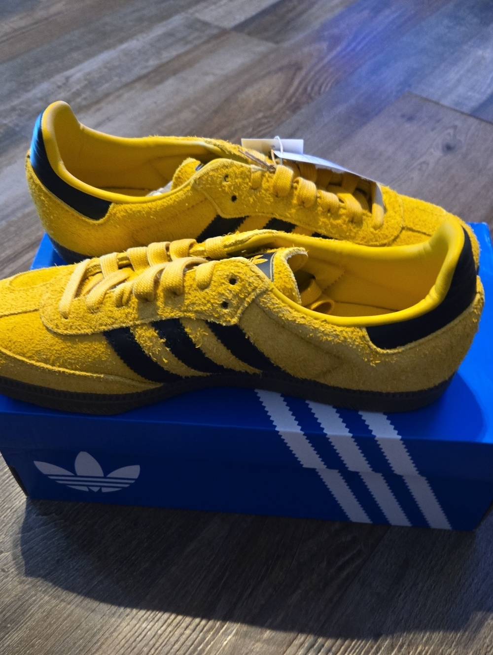 adidas Men"s Yellow Suede Sneakers with Black Stripes